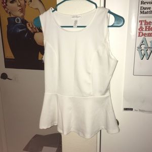 White, sleeveless peplum top